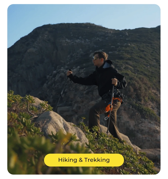 Climber on a coastal ridge in late afternoon light